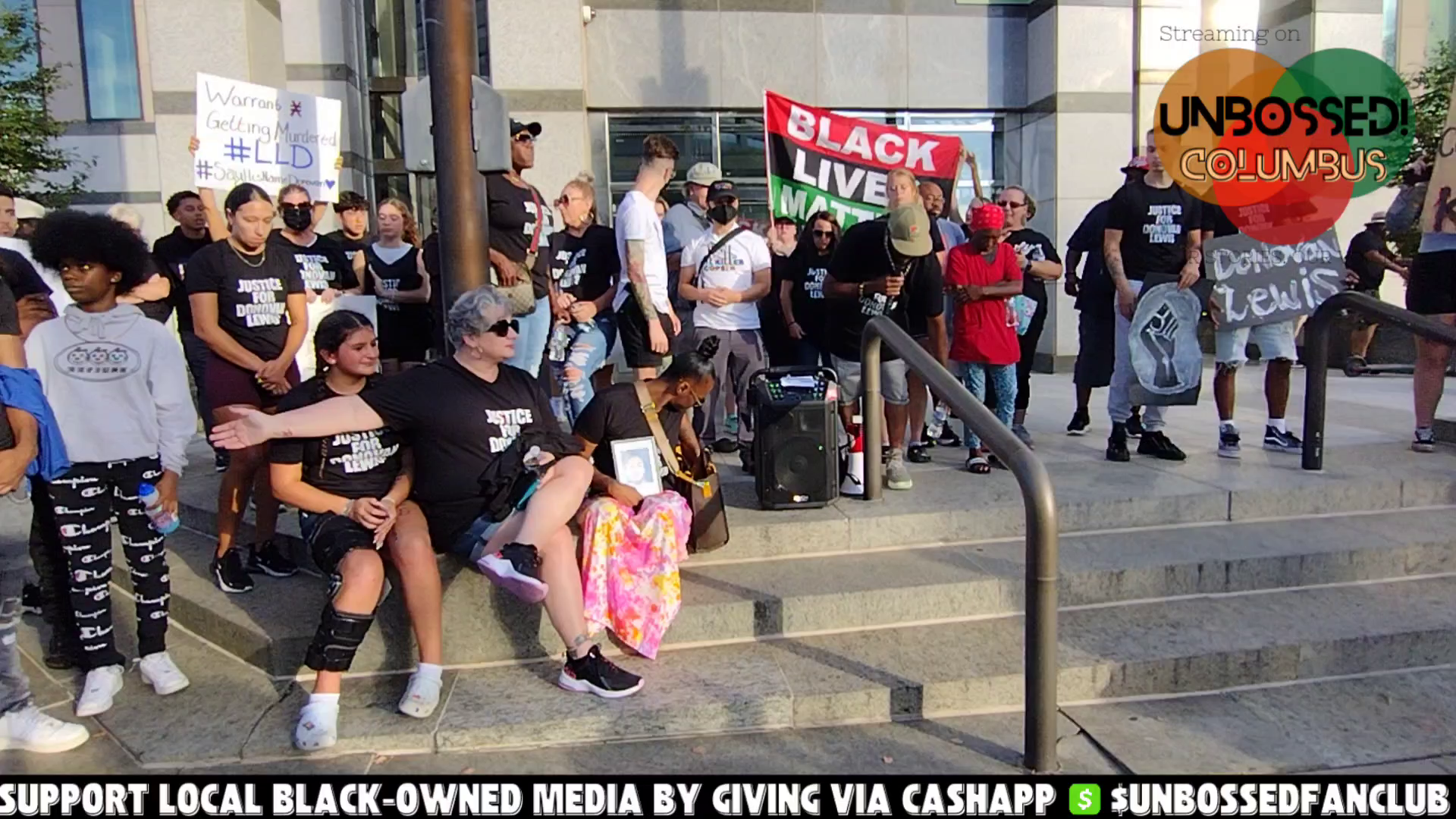 Father of Donovan Lewis Speaks to Crowd